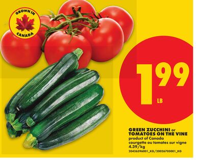 GREEN ZUCCHINI OR TOMATOES ON THE VINE